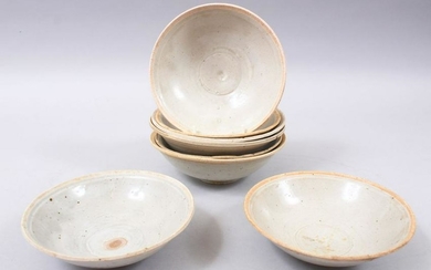 EIGHT EARLY CHINESE POTTERY GLAZED BOWLS, some glazed