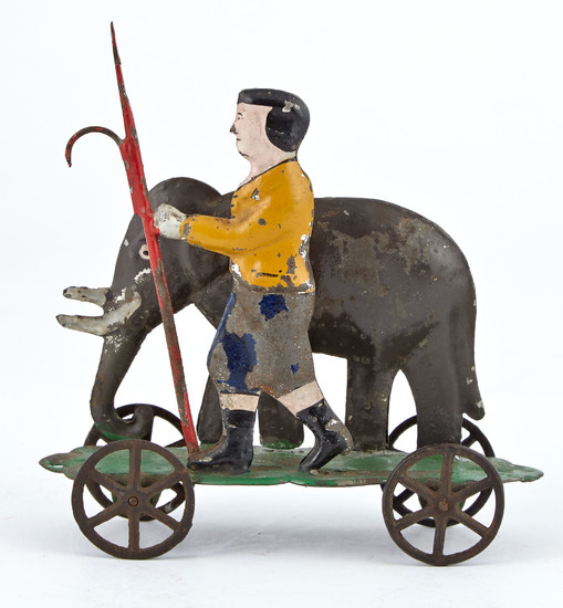 Elephant and Handler with Bullhook Tin Toy