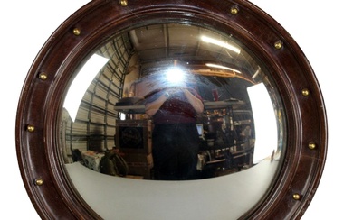 French round wood and brass butlers mirror in the style...