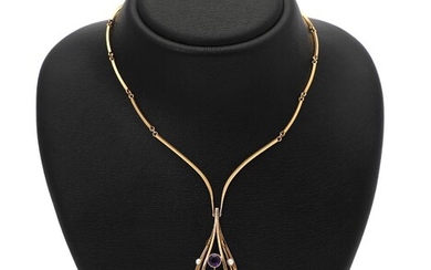 SOLD. Just Andersen: An amethyst and pearl necklace set with two circular-cut amethysts and five cultured pearls, mounted in 18k gold. L. 42 cm. Weight app. 27 g. – Bruun Rasmussen Auctioneers of Fine Art