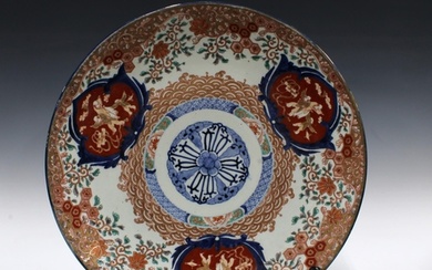 Large Imari charger, typically decorated and with underglaze...