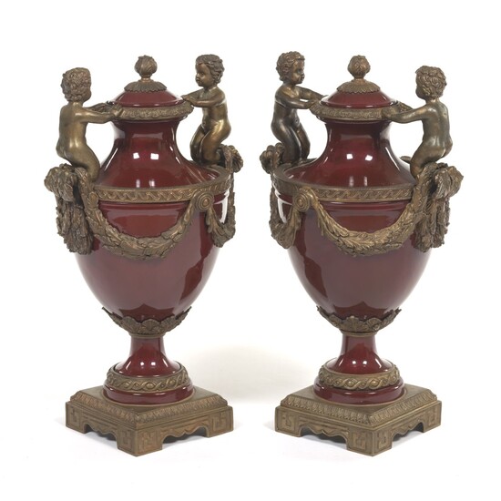 Pair of Porcelain and Bronze Urns