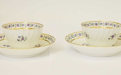 Pair of late 18th century New Hall-style spirally-fluted tea bowls and saucers