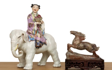 Porcelain model of an elephant and a girl Chinese, mid-20th...
