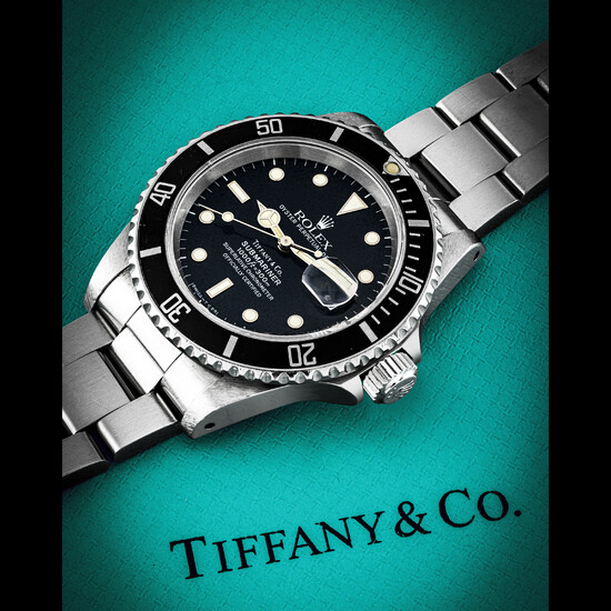 ROLEX. A RARE STAINLESS STEEL AUTOMATIC WRISTWATCH WITH SWEEP CENTRE SECONDS, DATE AND BRACELET SUBMARINER DATE MODEL, REF. 16610, RETAILED BY TIFFANY &AMP; CO.