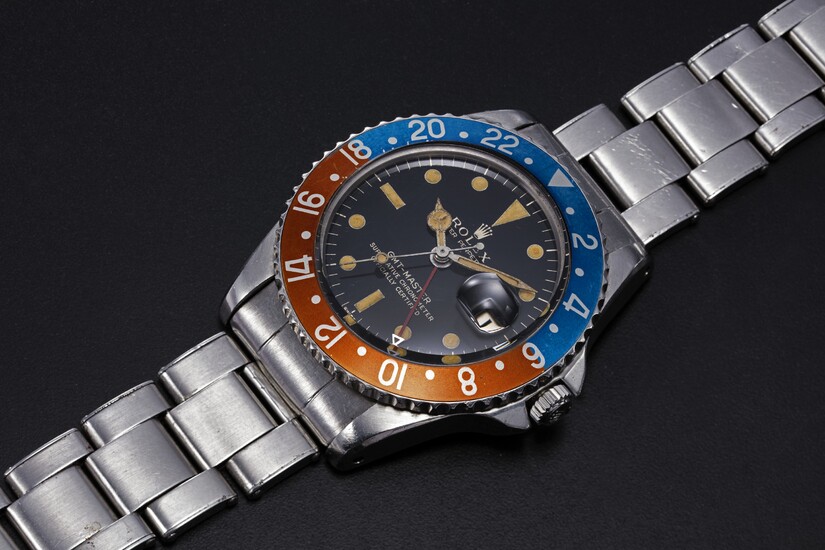 ROLEX, A RARE STEEL OYSTER PERPETUAL GMT-MASTER MADE FOR THE PERUVIAN AIR FORCE, REF. 1675