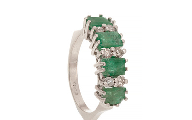 Ring in white gold, emeralds and diamonds.