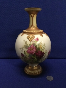 Royal Worcester blush ivory vase, with bulbous body decorate...