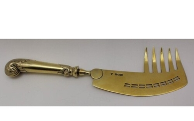 SILVER GILT SLICE with serving fork attachment, London 1904,...