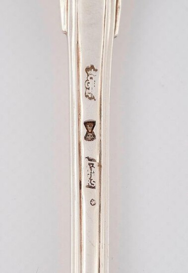 SILVER OLIVE SPOON, ANGERS 1770 by Guillaume-René HARDYE received in 1742. Model with nets with spatula engraved with a number. The spoon with a moulded edge is pierced with a rosette between two foliated scrolls. Pds. 148 g. Length. 32.2 cm.