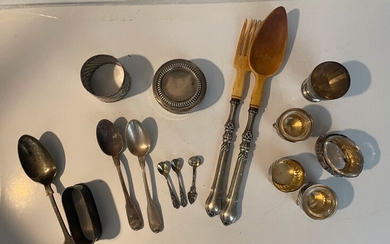 Set in silver 950/1000 including : 4 salt bowls 3 salt spoons 2 coffee spoons A napkin ring A small box One serving set One joined a napkin ring and a spoon in sterling silver 925/1000 Gross weight : 584 grs