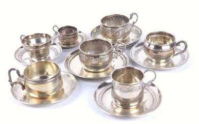 Set of seven silver cups and saucers, Louis XV and Louis XVI style.