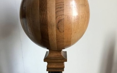 Sphere composed of different slices of wood and...