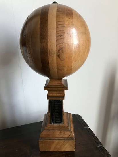 Sphere composed of different slices of wood and...