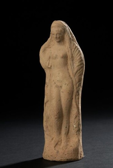 Statuette in high relief representing the goddess Aphrodite standing revealing her nakedness.