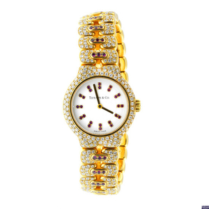 TIFFANY & CO. - a lady's 18ct gold diamond and ruby 'Tesoro' watch.