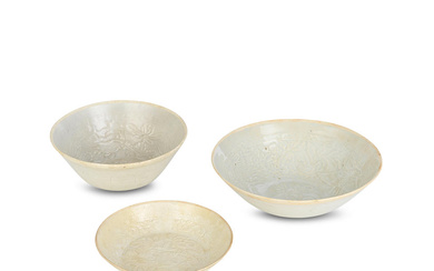 TWO QINGBAI MOULDED BOWLS AND A DISH Song Dynasty
