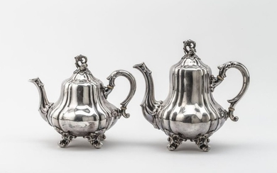 Tea and coffee pot. Each on four volute...
