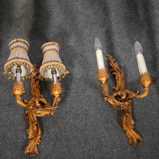 Three lacquered gilt metal two-light wall brackets