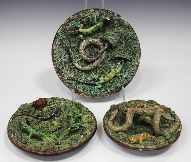 Three majolica Portuguese Palissy Ware dishes, late 19th century, each applied with various reptiles