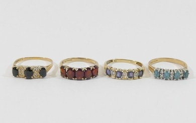 Two 9 carat gold gem-set half hoop rings, and two other gem-...