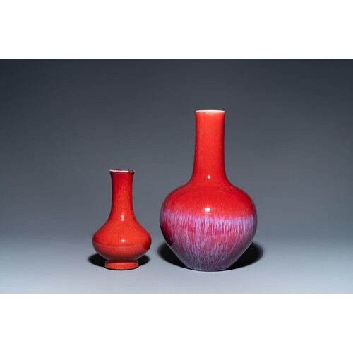 Two Chinese monochrome sang de boeuf-glazed bottle vases, 19...