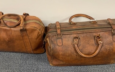 Two vintage leather bags, largest W. 53cm.