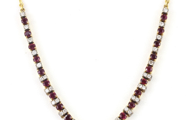 18CT RUBY AND DIAMOND WISHBONE STYLE NECKLACE.