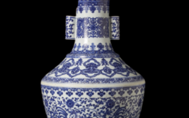 A blue and white porcelain vase decorated with geometric and floral motifs, with apocryphal Qianlong mark to the base (major...
