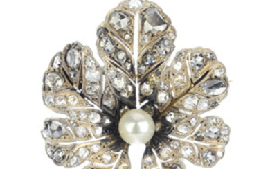 An early 20th century silver and gold, cultured pearl and diamond brooch. View more details