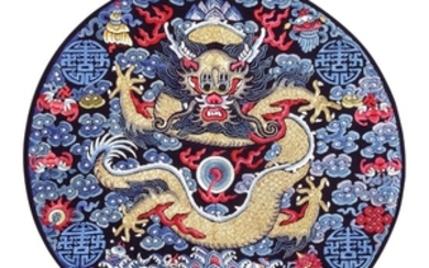 AN EMBROIDERED NAVY-BLUE SILK DRAGON ROUNDEL, LATE QING DYNASTY