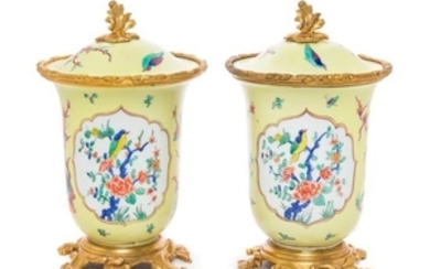* A Pair of French Gilt Bronze Mounted Porcelain Covered Jars