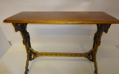 A 19th century table having mahogany top and interesting cas...