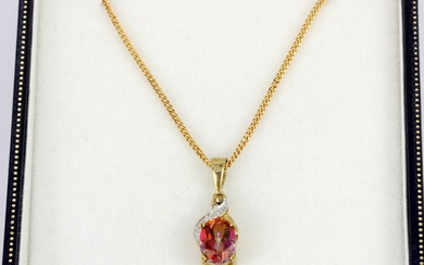 A 9ct yellow gold sunrise mystic topaz and diamond set pendant and chain, L. 44cm.