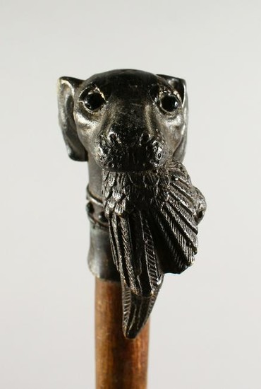 A CAST METAL DOG'S HEAD AND PHEASANT WALKING STICK.