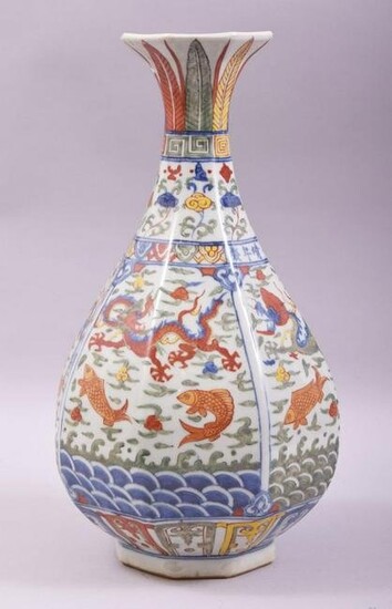 A CHINESE WUCAI OCTAGONAL FORM BALUSTER VASE, decorated