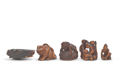 A COLLECTION OF CARVED WOOD NETSUKE 19th century, one signed...