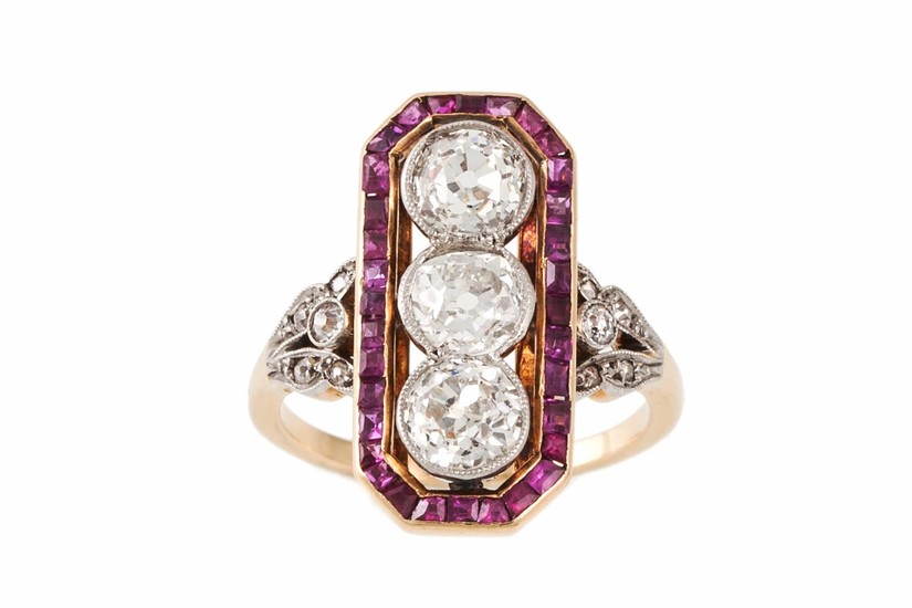 A DIAMOND AND RUBY PLAQUE RING, the central diamonds estimat...