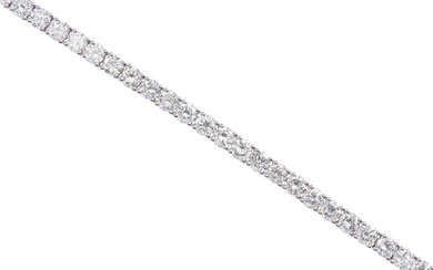 A DIAMOND LINE BRACELET IN 18CT WHITE GOLD, SET WITH ROUND BRILLIANT CUT DIAMONDS TOTALLING 6.75CTS, LENGTH 170MM, 13.2GMS