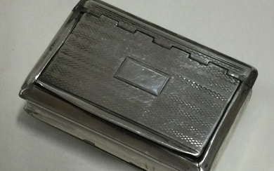 A George III silver snuff box with hinged lid.