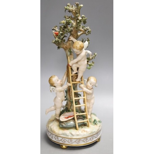 A German porcelain Meissen style group of amorini, climbing ...