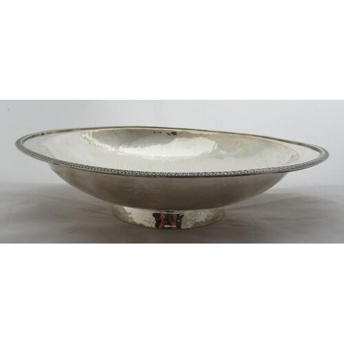 A Hukin & Heath oval silver bowl, with embossed edge and ham...