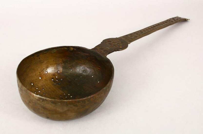 A LARGE BATAVIAN BRONZE STRAINER/LADLE with engraved