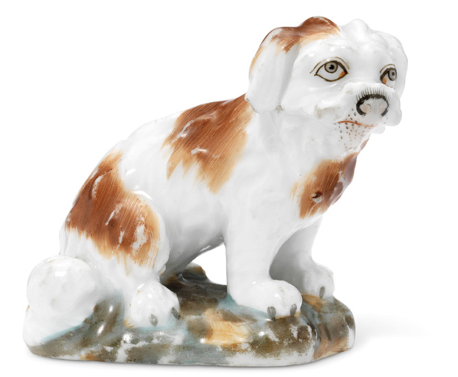 A MINIATURE PORCELAIN FIGURE OF A DOG, BY THE POPOV PORCELAIN FACTORY, MOSCOW, MID-19TH CENTURY
