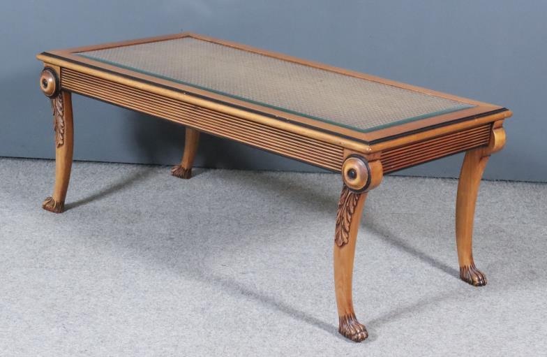 A Modern Fruitwood and Ebonised Rectangular Coffee Table, the...