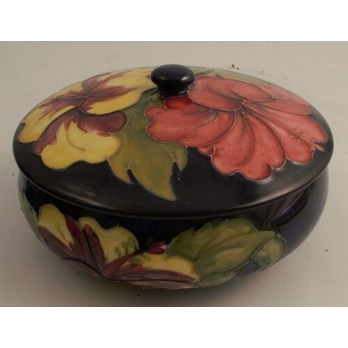 A Moorcroft covered shallow bowl, decorated in the Hibiscus ...