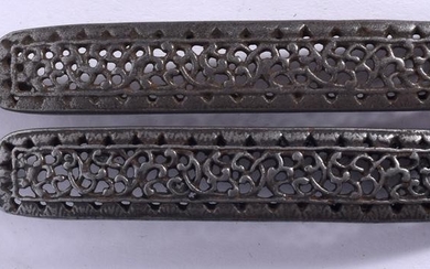 A PAIR OF MIDDLE EASTERN SILVER BUCKLE, reticulated in