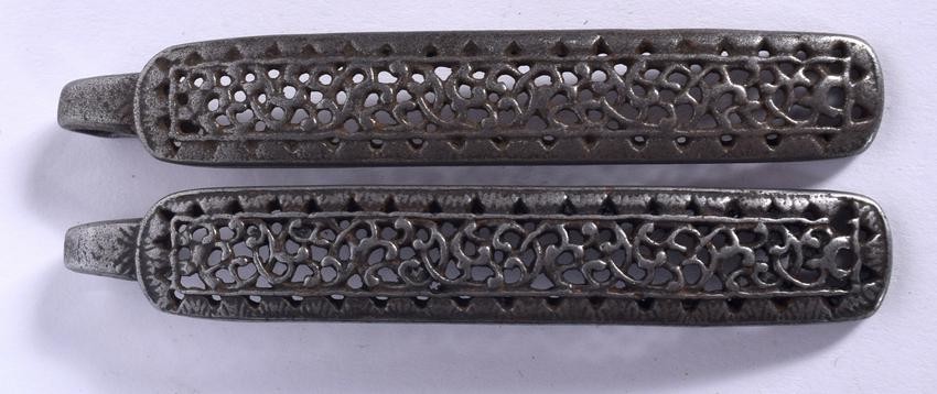A PAIR OF MIDDLE EASTERN SILVER BUCKLE, reticulated in