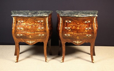 A Pair of Small Vintage Louis XV Style Marquetry Commodes. The marble serpentine tops with moulded e