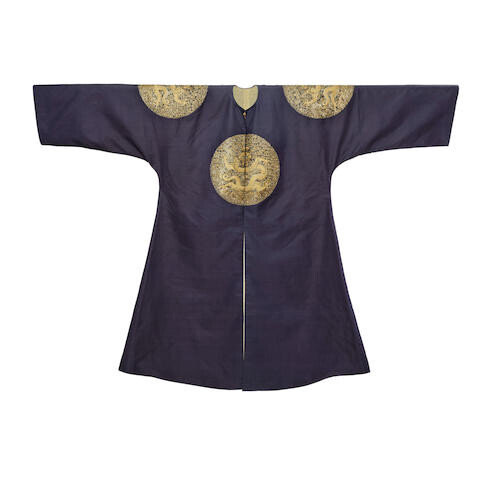 A RARE IMPERIAL MIDNIGHT-BLUE GOLD AND SILVER COUCHED PRINCE'S SURCOAT, BUFU